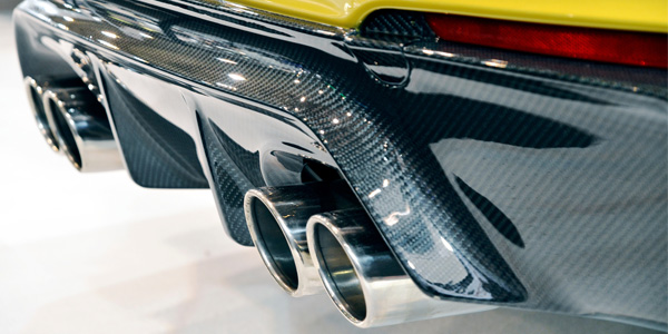 High performance car with carbon fibre pipe and detailing.